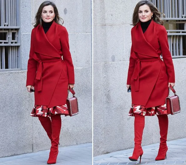 Queen Letizia wore Carolina Herrera red coat, Zara print skirt, and Zara Crossbody bag and Uterque red boots
