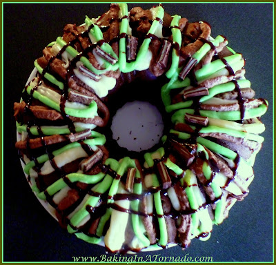 Chocolate Andes Cake, a dense chocolate cake flavored and decorated with mint | Recipe developed by www.BakingInATornado.con | #recipe #chocolate #mint #cake