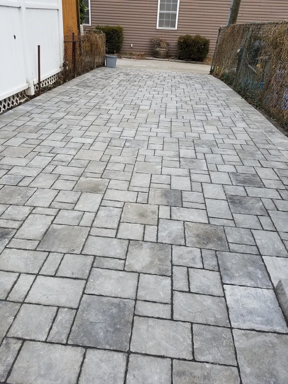 Custom Stoneworks & Design Inc. Hampden miracle on 34th St backyard pavers