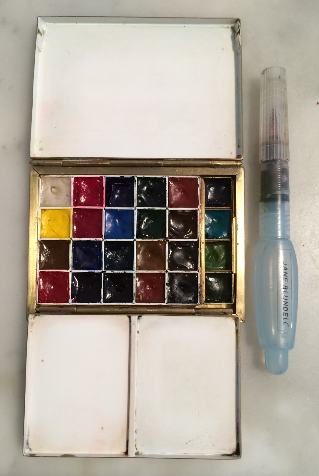 Jane Blundell Artist Watercolour and gouache choices some of my palettes painted out.