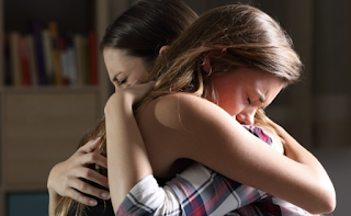 Soothing touch eases the pain of social rejection, study finds: An in-person hug is much more effective than 'liking' a post or texting an emoji