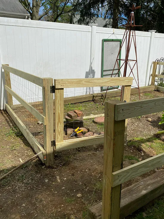 swinging wooden garden gate