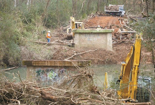An image of demolition of the bridge