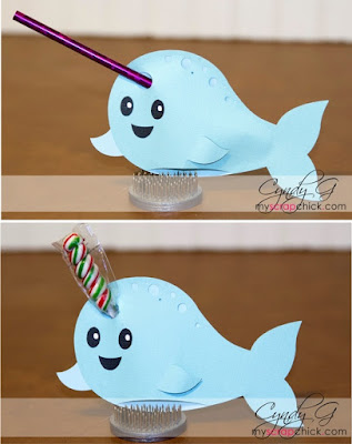 Card shaped like a Narwhal that holds a pencil or twist sucker as it's horn