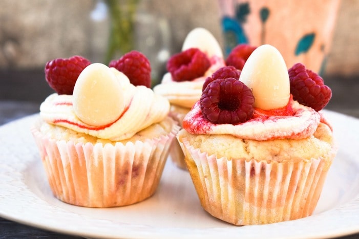 raspberry & white chocolate cupcakes topped with vegan buttercream raspberry & white chocolate cupcakes topped with vegan buttercream