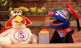 Grover turns on the kit and plays an animal sound. Super Chicken comes there. Sesame Street Episode 4071, Professor Super Grover's School for Superheroes