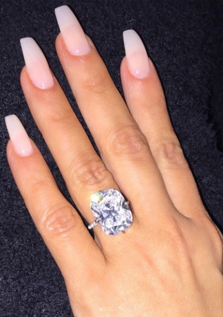 2 Kim K reacts to reports she's dumping Kanye, shows off her ring