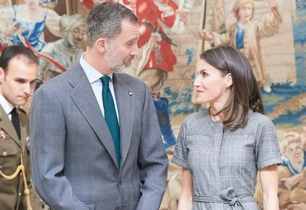 Queen Letizia wore Massimo Dutti wool check belted dress