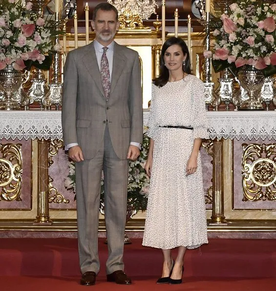 Queen Letizia wore Emporio Armani Crepon long dress with polka dot jacquard motif. Doñana Natural Park in Almonte