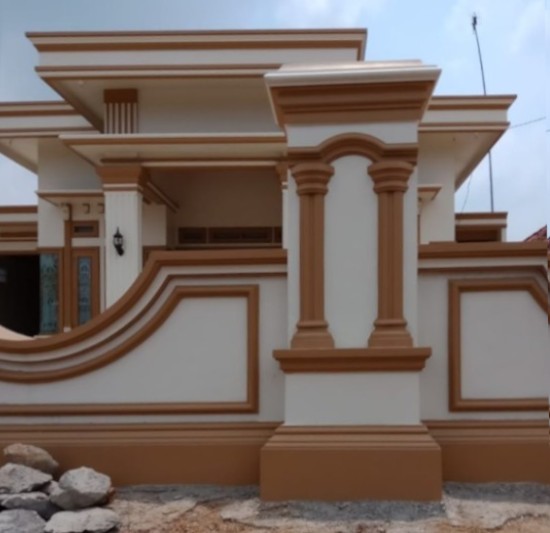 rumah minimalis kombinasi warna coklat krem dan orange kuning emas