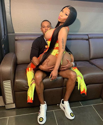 Kenneth Petty with his wife Nicki sitting in his lap