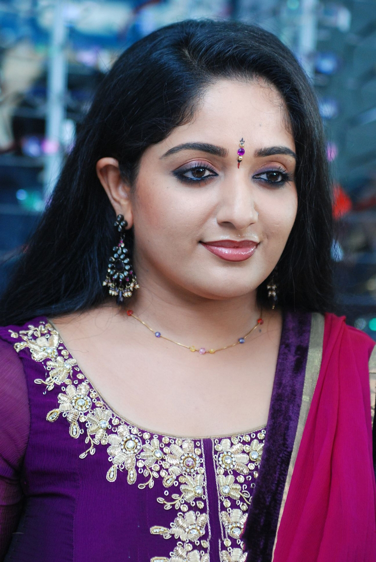 Very Cute Enchanting Face of Kavya Madhavan in Purple Churdar - South
