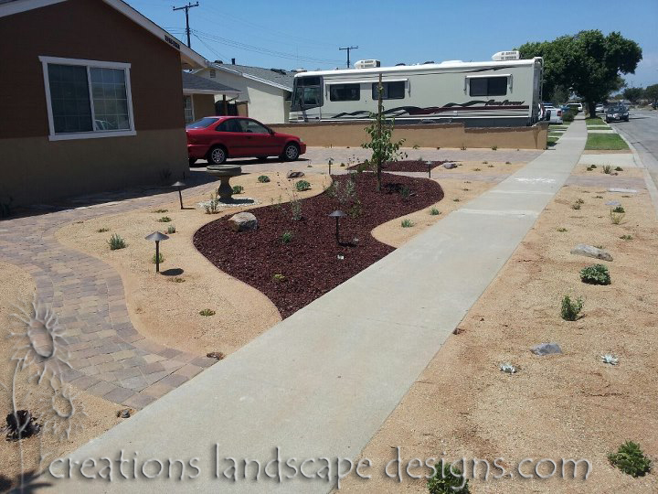 earth friendly landscapes I LIKE USING DG AS MULCH