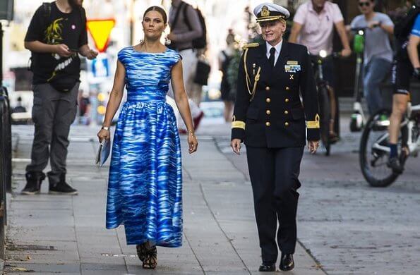 Crown Princess Victoria wore a Camilla Thulin sea blue print dress and Anya Hindmarch metallic clutch