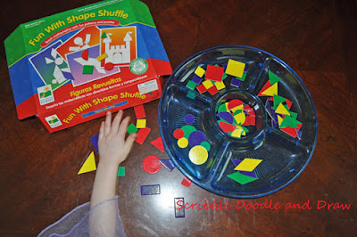 Sort shapes using a plastic tray