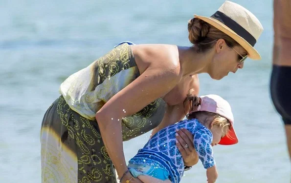 Princess Madeleine, Princess Leonore and Prince Nicolas of Sweden on holiday in Saint Tropez, France. Princess Madeleine wears new summer dress, skirt, tops