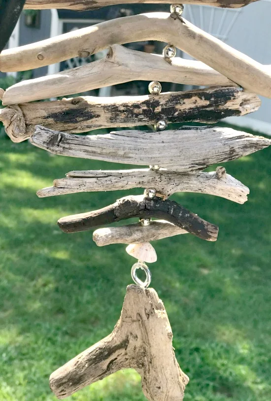 Driftwood hanging using silver bead spacers