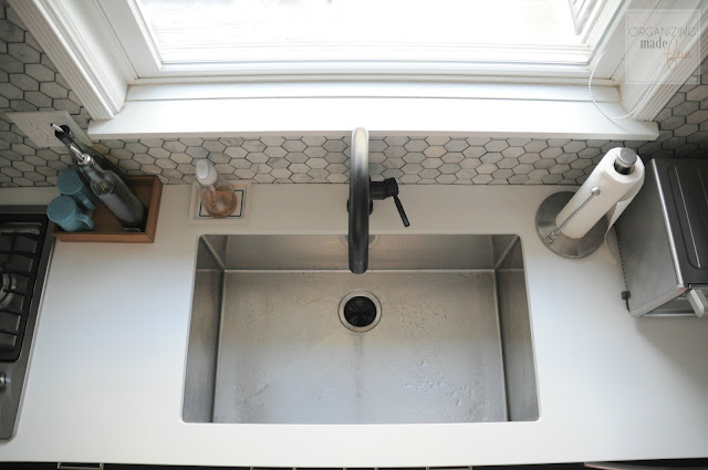 Large, deep stainless steal sink with Brizo touch-sensor faucet in matte black :: OrganizingMadeFun.com