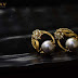 Fancy golden pearl earrings