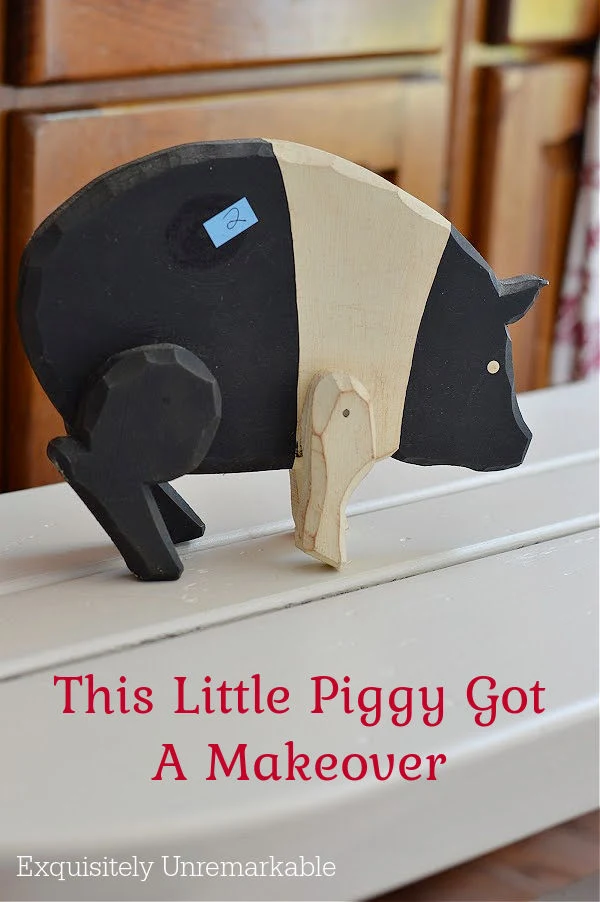 This Little Piggy Got A Makeover wooden pig on a bench