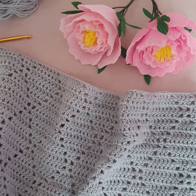 Beautiful peek-a-boo crochet baby blanket