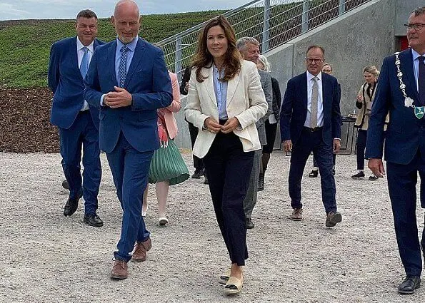 Crown Princess Mary wore Chanel black and cream espadrilles flats. Princess wore an ivory blazer and navy trousers