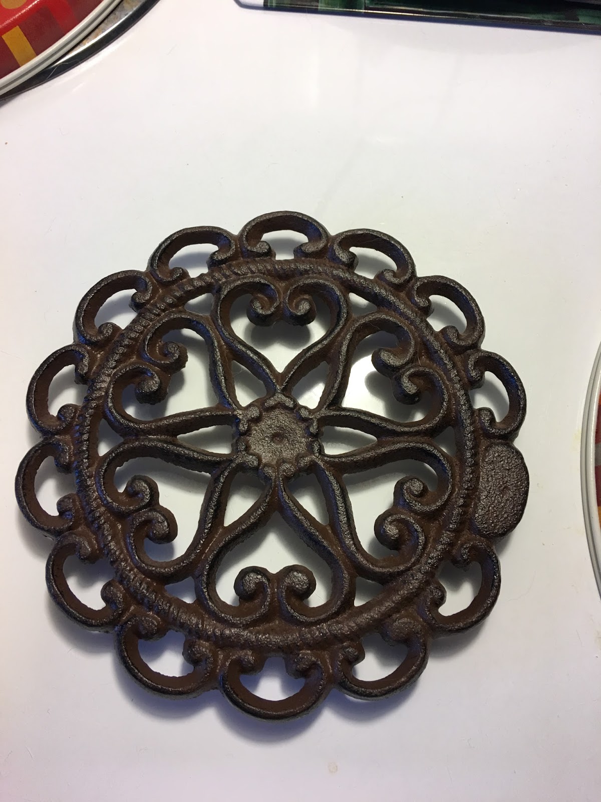 Reviews, Views and Everything Else Cast Iron Trivet Round with
