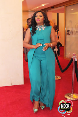 Omotola stuns in Tiffany Amber jumpsuit at Fifty movie premiere