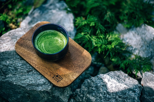 wooden cup with matcha tea