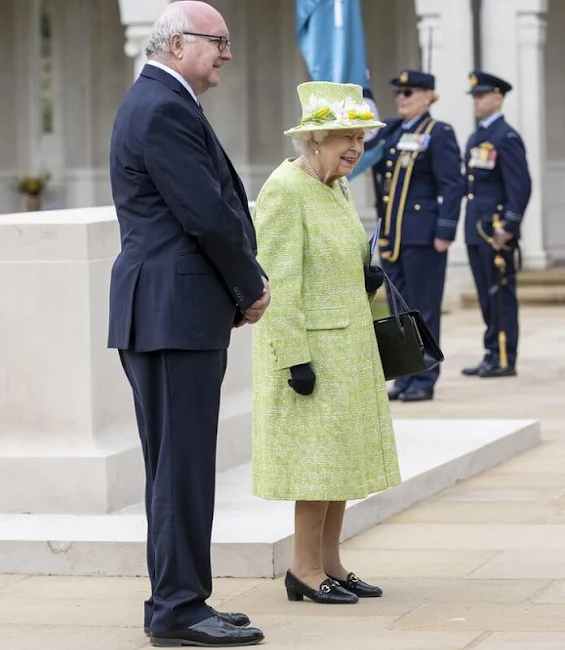 Queen Elizabeth, wearing a lime green coat and the Wattle brooch presented to her on first tour of Australia in 1954