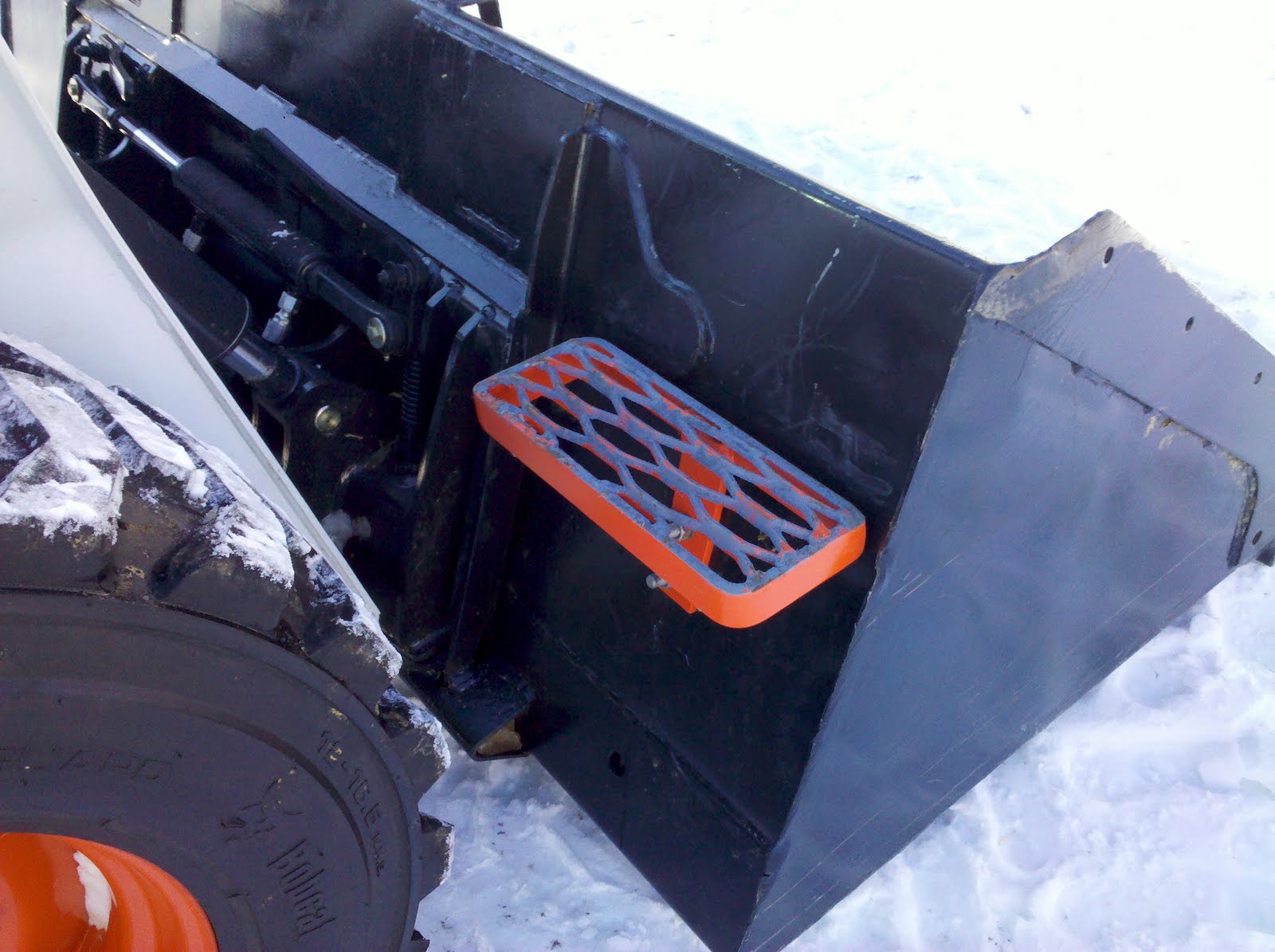 Herbold Metal Werks AgriStep Skid loader bucket steps