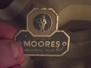 Moores of Brighton dealer badge