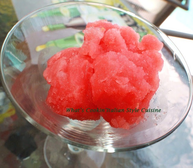 this is a martini glass filled with watermelon sorbet