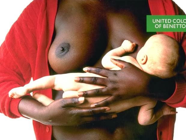 United Colors of Benetton - mulher negra amamenta criança branca - 1989