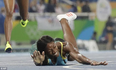 2 Sprinter accused of cheating by diving over finish line to win gold says she didn't dive but tripped & can't remember what happened