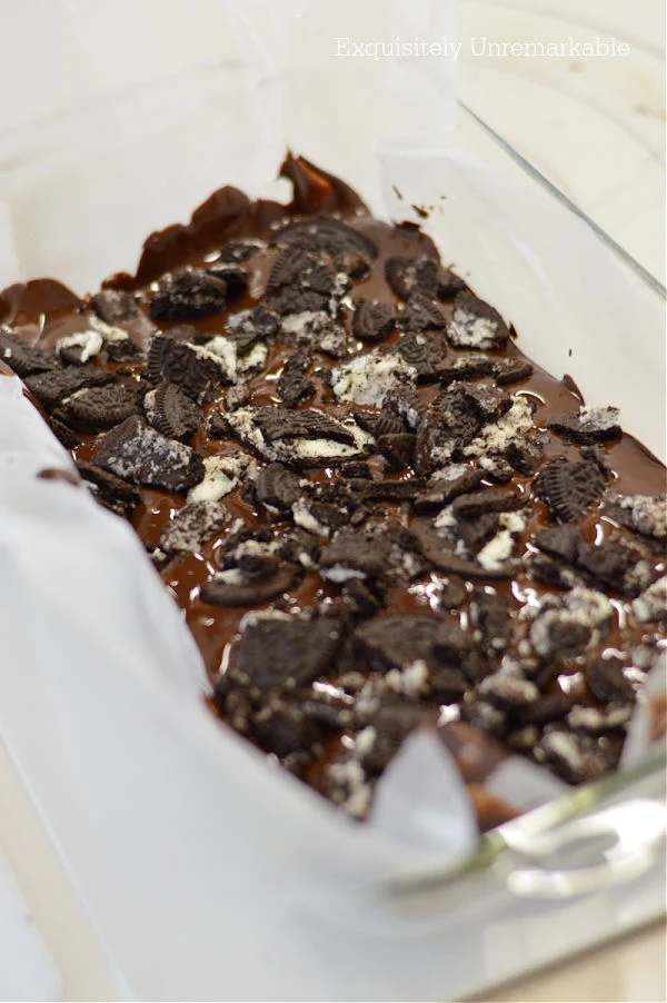 Oreo Chocolate Bark In glass pan with wax paper