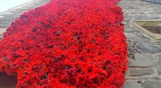 Crochet Poppy Display Outside the Church