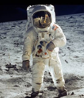 Buzz Aldrin walking on the moon
