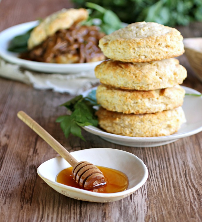Recipe for cornmeal biscuits, sweetened with honey, and served with a BBQ pulled brisket.