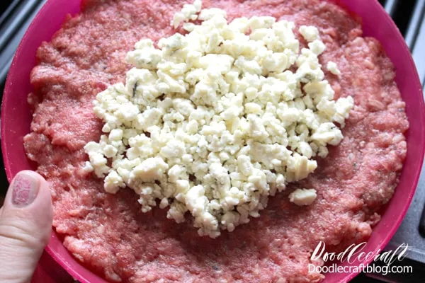 Step 2: Form Patty   Take one cup of ground beef and smoosh it flat on a small plate.  Pile the blue cheese on top of the burger in the center.