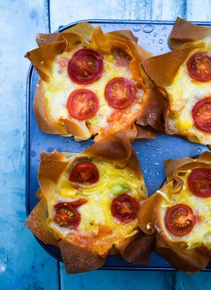 cheese and red pepper pies in a muffin tray