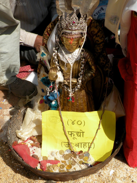 Buddhist deity image adorned with jewelry 