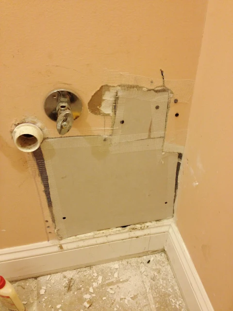 trying to patch wall holes