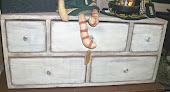 lots of primitive furniture and other pieces