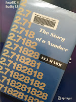 e: The Story of a Number,  by Eli Maor, superimposed on Intermediate Physics for Medicine and Biology.