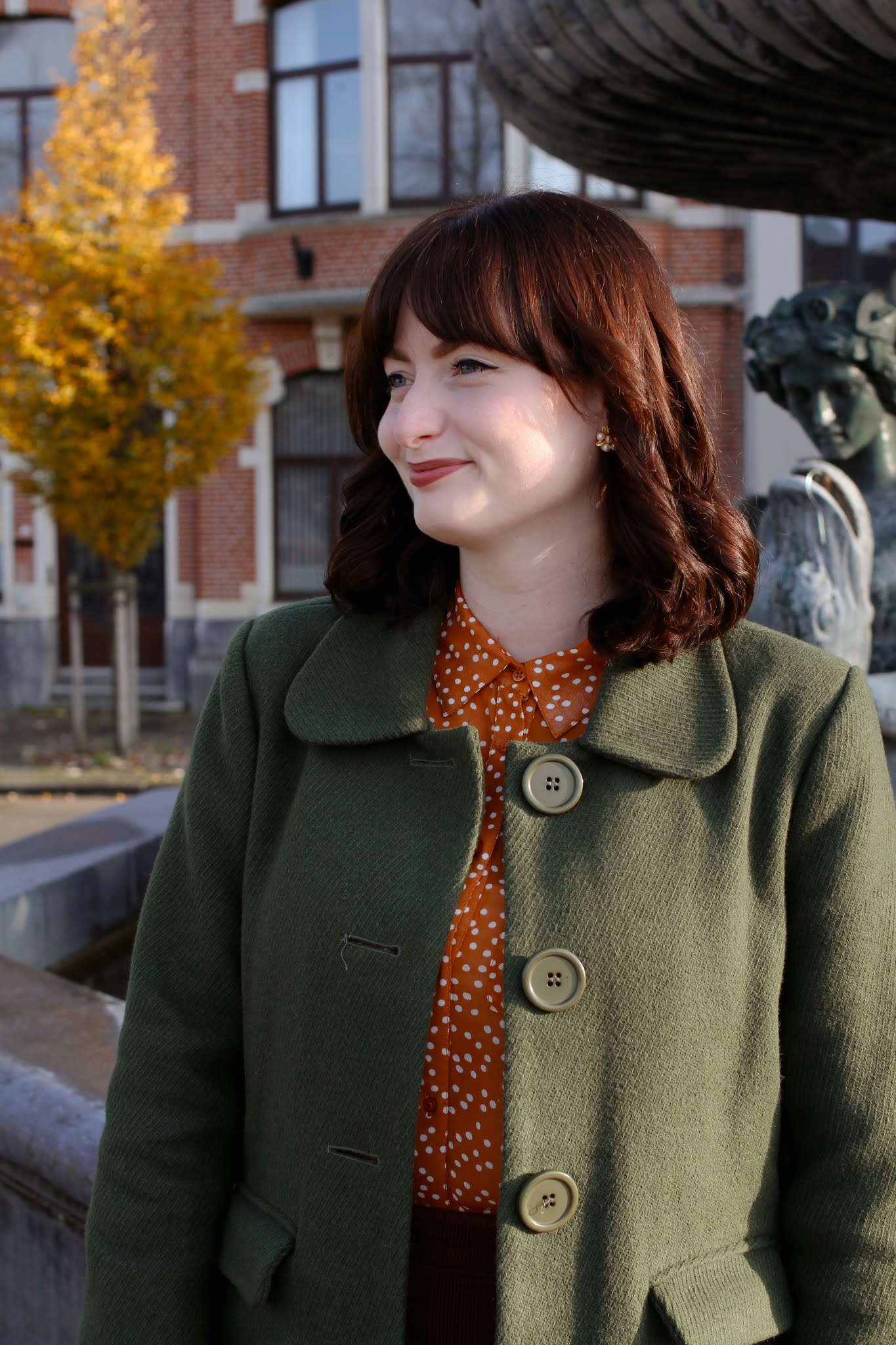 An autumnal outfit featuring a Princess Highway olive green coat