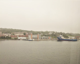 harbor with industrial area in background