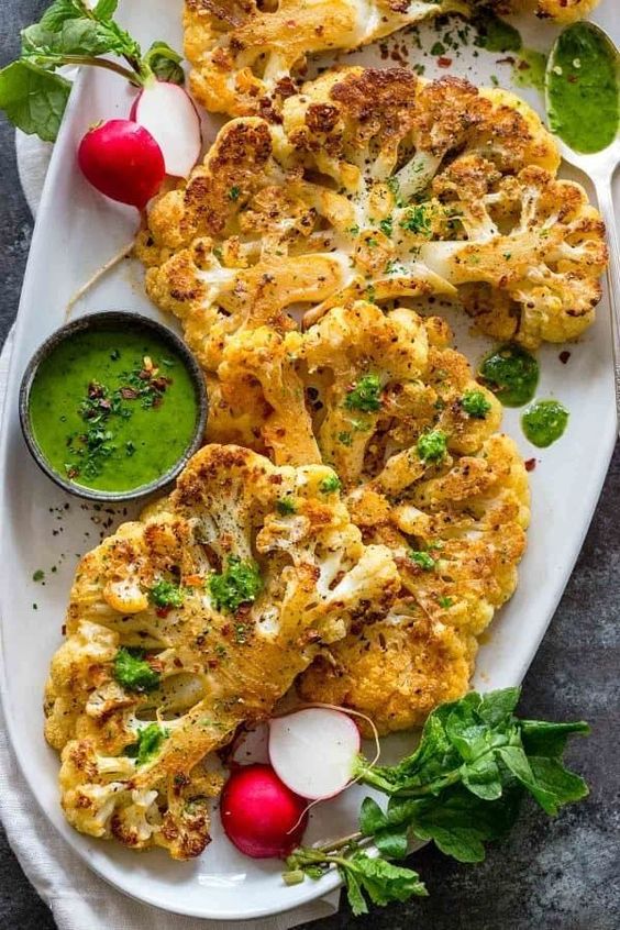 Cauliflower steaks are easy to make entre that is oven roasted with