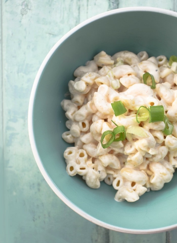 A close up of cheese pasta salad