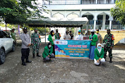 Mahasiswa KKN Bersama BPBD, TNI, POLRI Dan Ormas Gemantara Aceh Melakukan Penyemprotan Disinfektan Dan Pembagian Masker